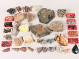 many different types of rocks and stones on the table