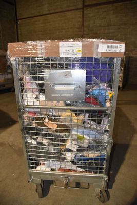 a metal cart with a bunch of items inside of it