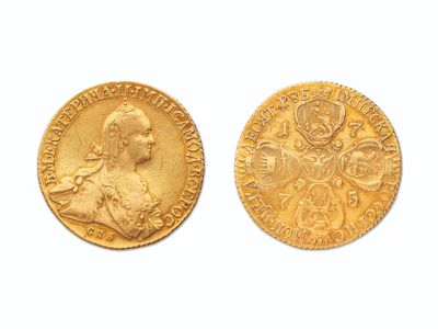 deux souverains d'or, dont l'un représente un buste et l'autre un buste
