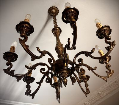 a chandelier that is hanging from the ceiling