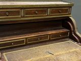 a wooden desk with a drawer on top of it