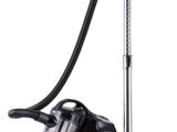 a black and silver vacuum cleaner and a black canister