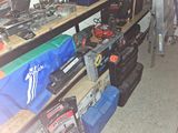 many tools on the shelves in the garage