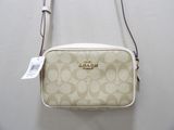 coach cross body bag in signature canvas