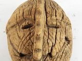 an image of a close up of a nut with a face on it