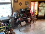 an image of a living room with a lot of clutter on the floor