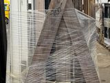 a wooden structure that has been wrapped in a net