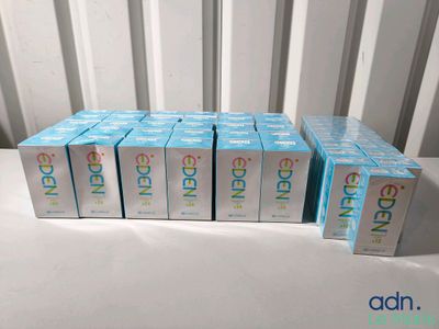 six boxes of condoms sitting on top of a white table