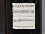 a label on a bottle of wine on a table