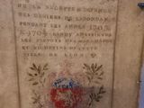 a close up of a plaque on a wall in a room
