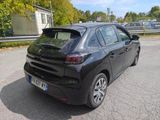 a black car parked on the side of the road