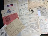 a pile of old papers that are on a table