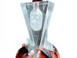 a bottle of alcohol sitting on top of a piece of glass