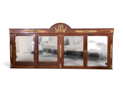 a mirror that is on the side of a cabinet