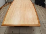 a large wooden table in the middle of a room