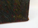 a close up of a painting on a white surface