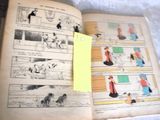 an open book with pictures of people and animals on it