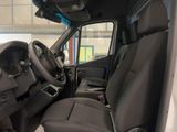 a view of the inside of a van from the driver ' s seat