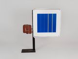 a small solar panel on a metal stand on a white background