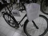 a bike with a bag on the back of it