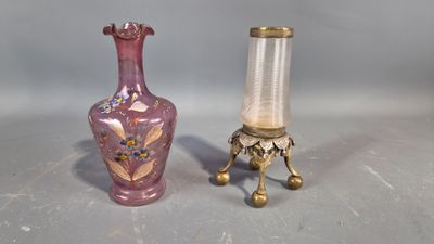 two vases sitting next to each other on a table