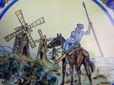 a plate with a picture of a man on a horse