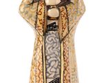 une image représentant une figurine de femme en robe