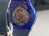 a close up of a watch on a table