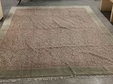 a large rug on the floor in a room