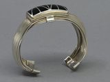 silver cuff bracelet with black onyxine stone and silver wire