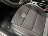 a picture of the inside of a car with a steering wheel