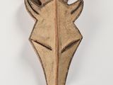 an image of a wooden deer head mounted on a wall