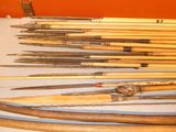 a lot of bamboo sticks that are on the table