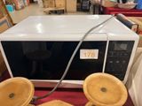 a microwave that is sitting on top of a table
