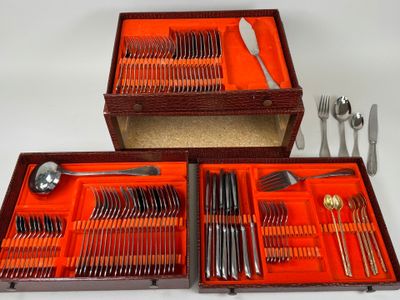 two trays with forks, spoons, and knives in them