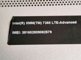 a label on the back of a laptop that says intel xm / tm / tm 750 lte - advanced