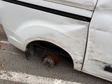 an image of a car that has been badly damaged