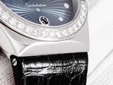 a close up of a wrist watch with diamonds on it