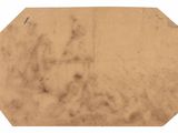 a close up of a piece of paper on a white surface