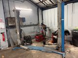 an image of a garage with a lot of tools in it