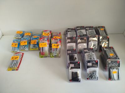 many different types of screws and screws on the table