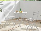 two chairs and a table on the deck