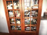 a book case with a lot of books inside of it