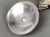 a silver object that is sitting on a table