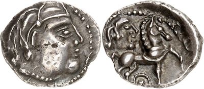 a silver coin with an image of a woman and a horse on it