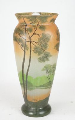 a vase with a painting of a tree on it