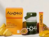 a bottle of nutrition next to some bananas and a box of nutrition