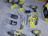 a lot of tools that are laying out on the floor