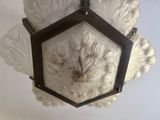 a light that is hanging on the wall in the room