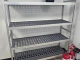 a metal shelf that has a fire extinguisor on it